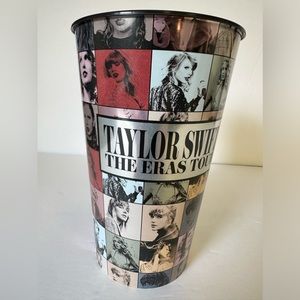 Taylor Swift The Eras Tour plastic cup. 28 oz. Black with pictures of Taylor.